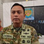 Viral Pria Berkaos Loreng Diduga Halangi Polisi di Garut, Dandim Tegaskan Bukan Anggota TNI Aktif